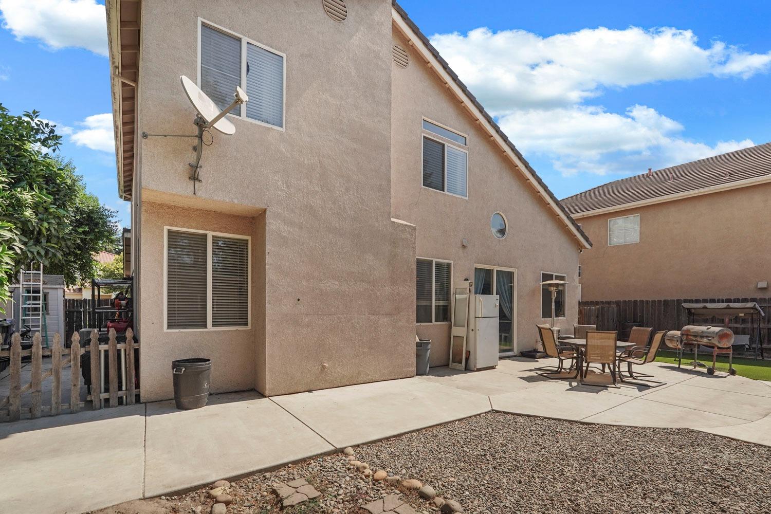 924 Dancer Way Turlock, CA 95382 - Photo 37 of 42 a view of a house with patio