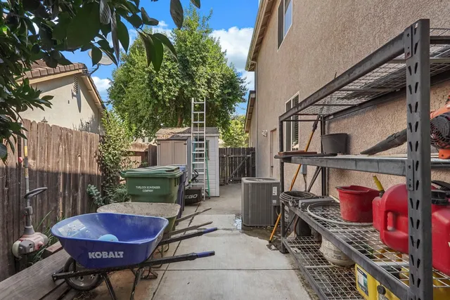 a view of a chairs and tables in the balcony