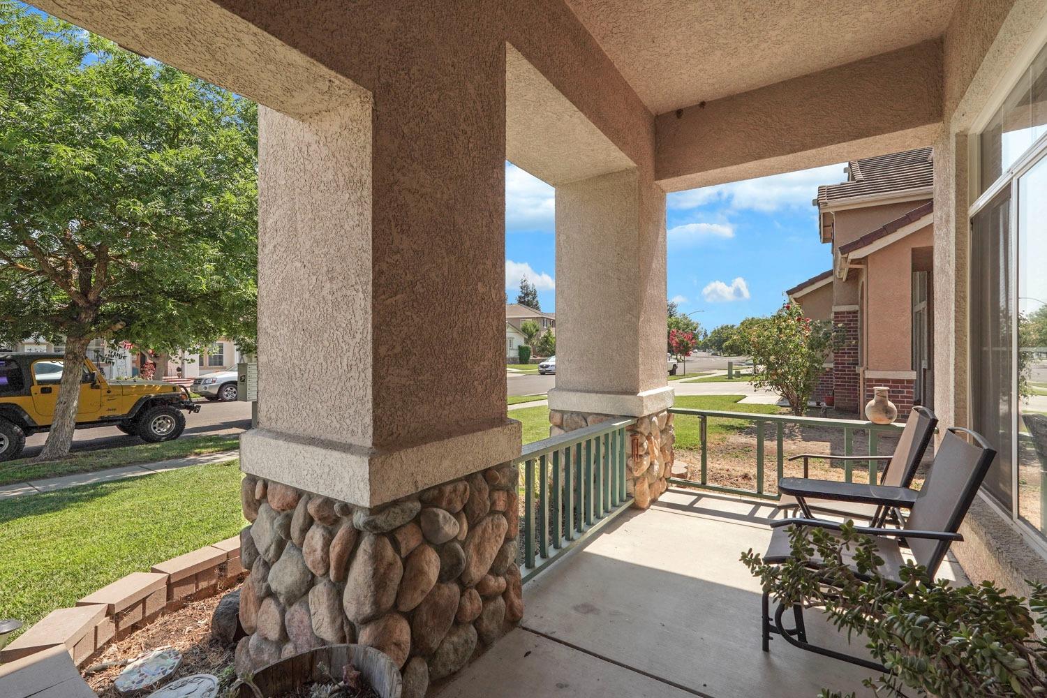 924 Dancer Way Turlock, CA 95382 - Photo 6 of 42 a view of a balcony with chairs