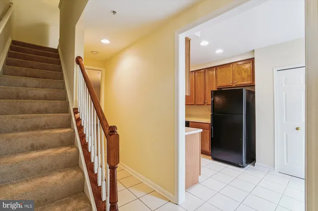 a view of a hallway with white walls