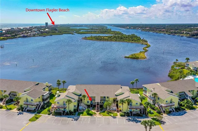 an aerial view of a houses with outdoor space