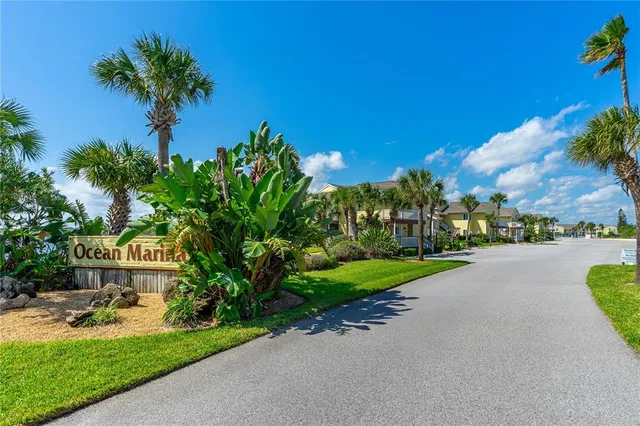 an aerial view of a house with outdoor space swimming pool patio and outdoor seating