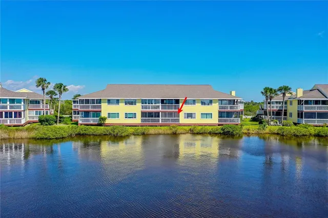a view of swimming pool with outdoor seating and yard