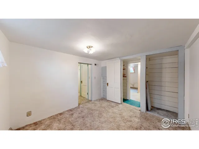 a bathroom with a toilet a sink and a mirror