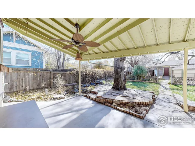 a bathroom with a sink mirror and vanity