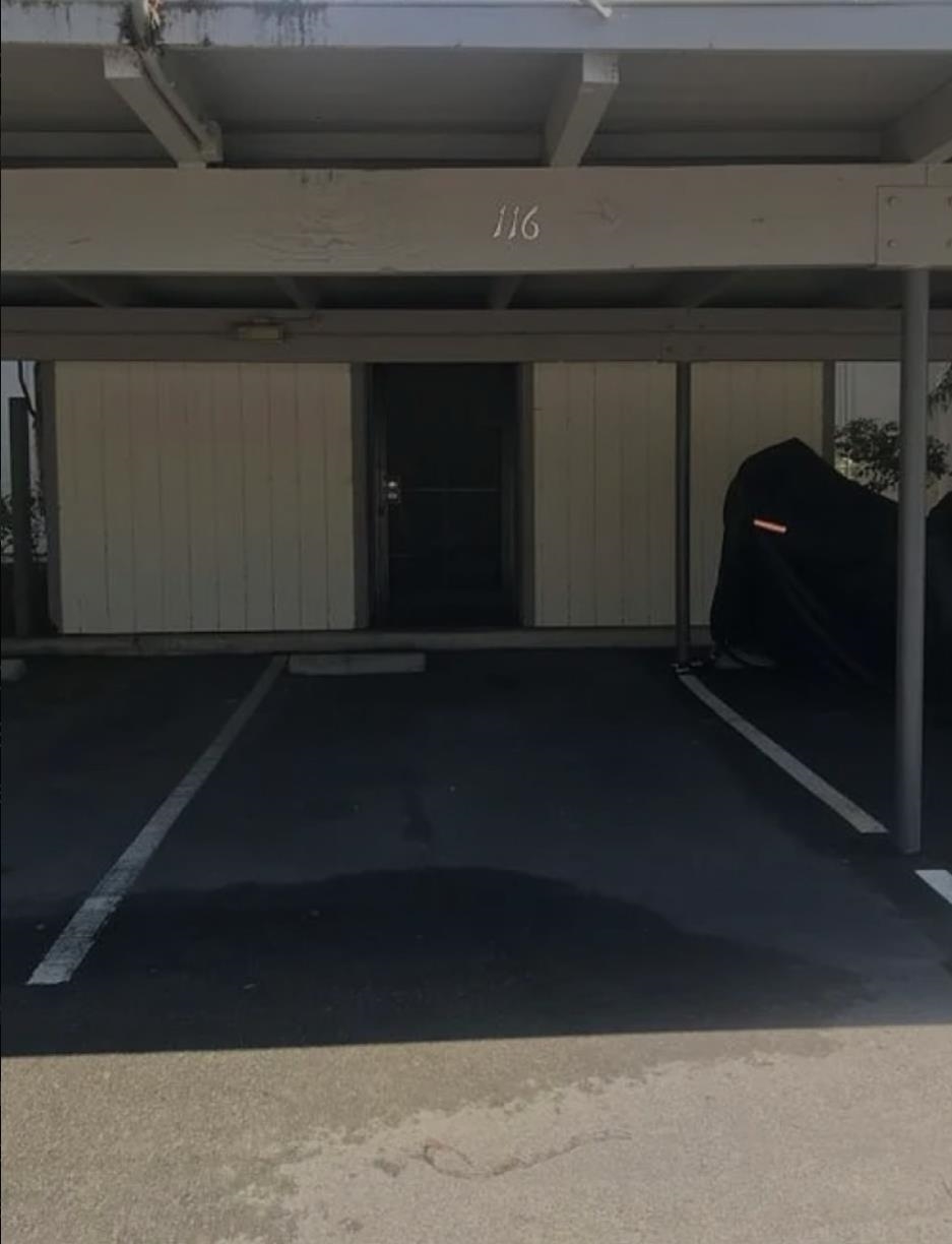 4081 Clayton Road, Unit 122 Concord, CA 94521 - Photo 13 of 29 a living room with a car parked