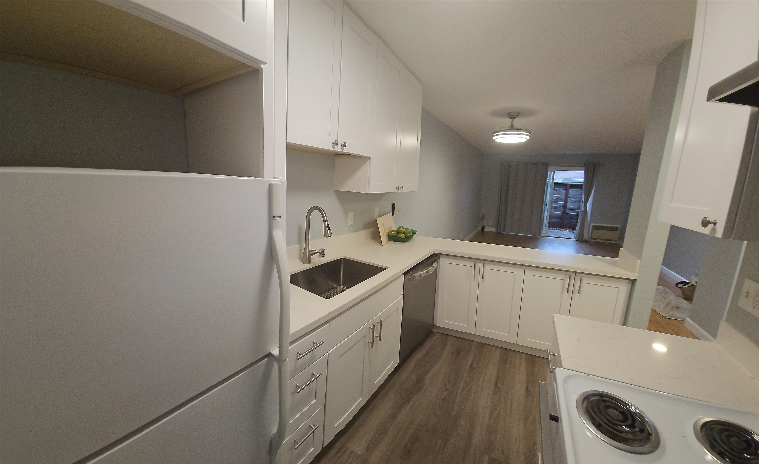 4081 Clayton Road, Unit 122 Concord, CA 94521 - Photo 23 of 29 a kitchen with a sink a stove and cabinets