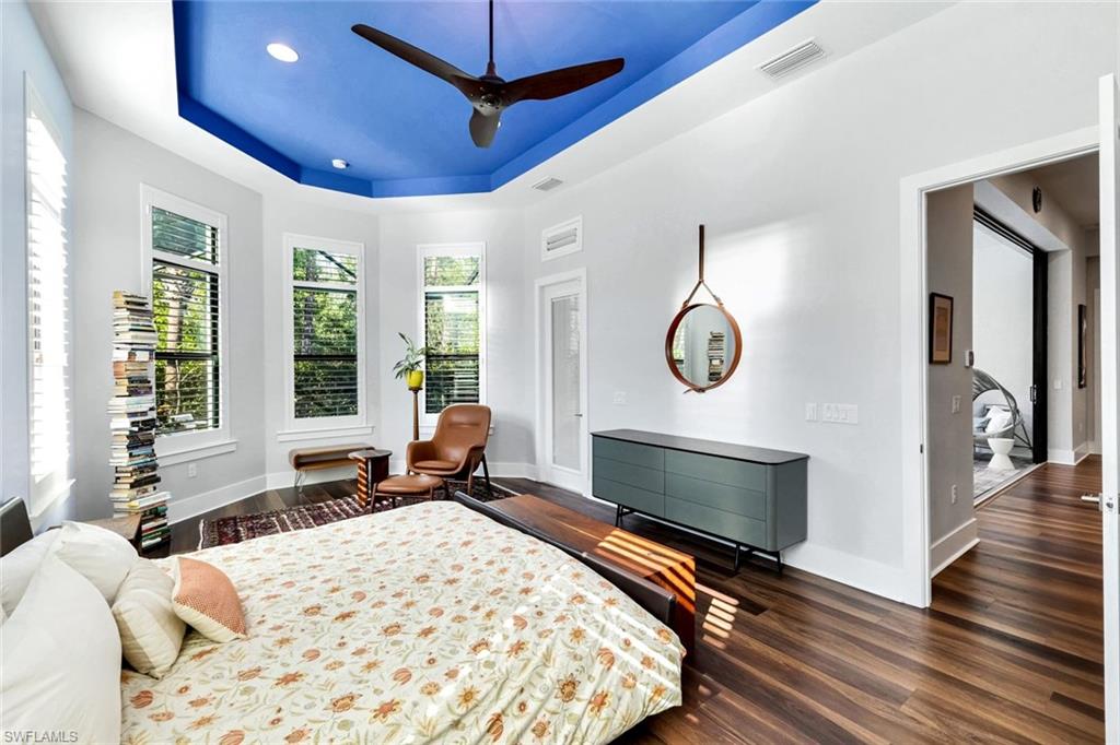 16249 Verilyn Circle Naples, FL 34110 - Photo 19 of 48 a living room with a bed furniture and a window