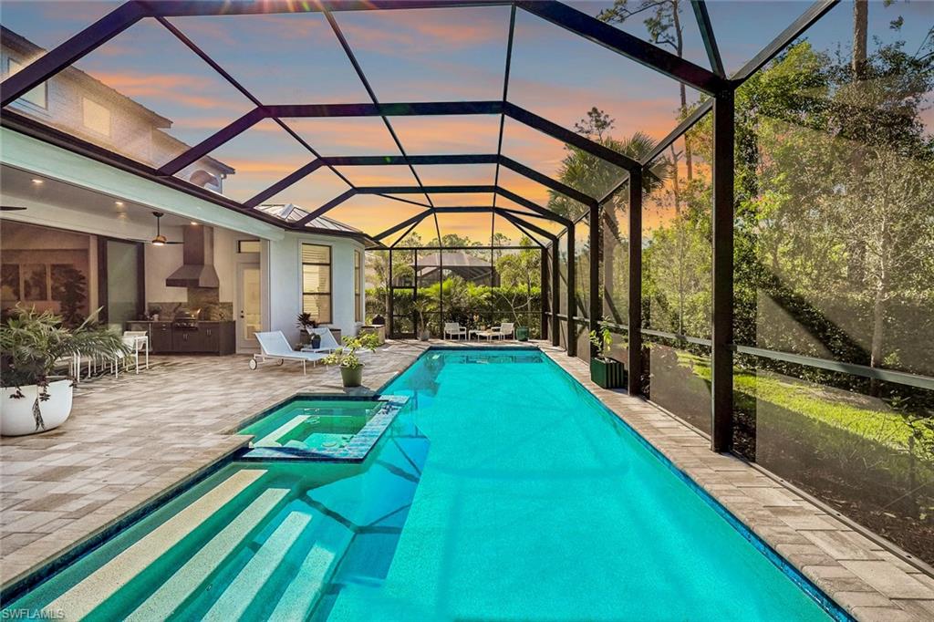 16249 Verilyn Circle Naples, FL 34110 - Photo 41 of 48 a view of swimming pool with outdoor seating