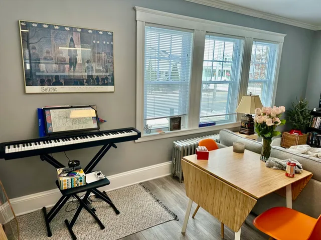 a room with furniture and window