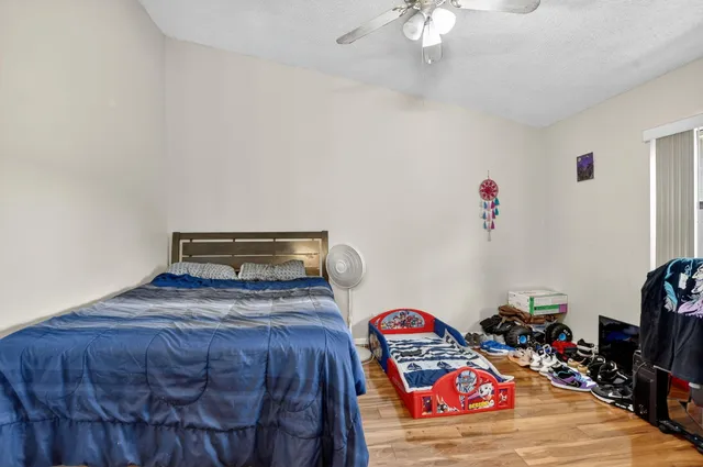 a bathroom with a shower and a toilet