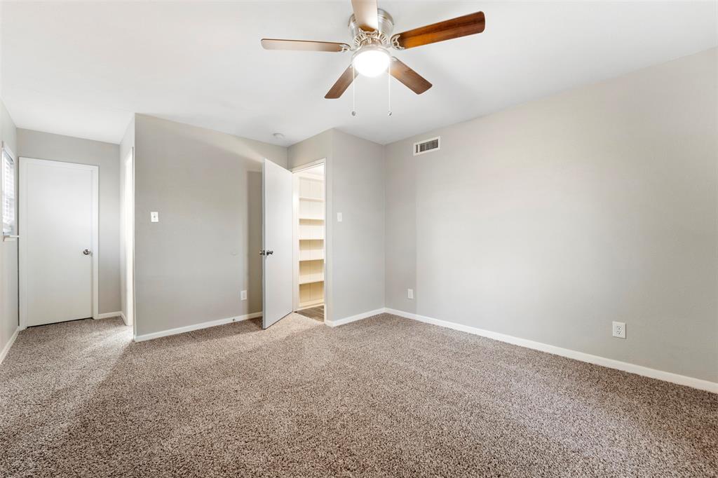 928 Overdowns Drive Plano, TX 75023 - Photo 6 of 11 an empty room with closet and windows