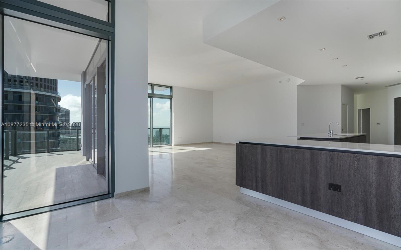 88 Southwest 7th Street, Unit 4001 Miami, FL 33130 - Photo 6 of 21 wooden floor in an empty room