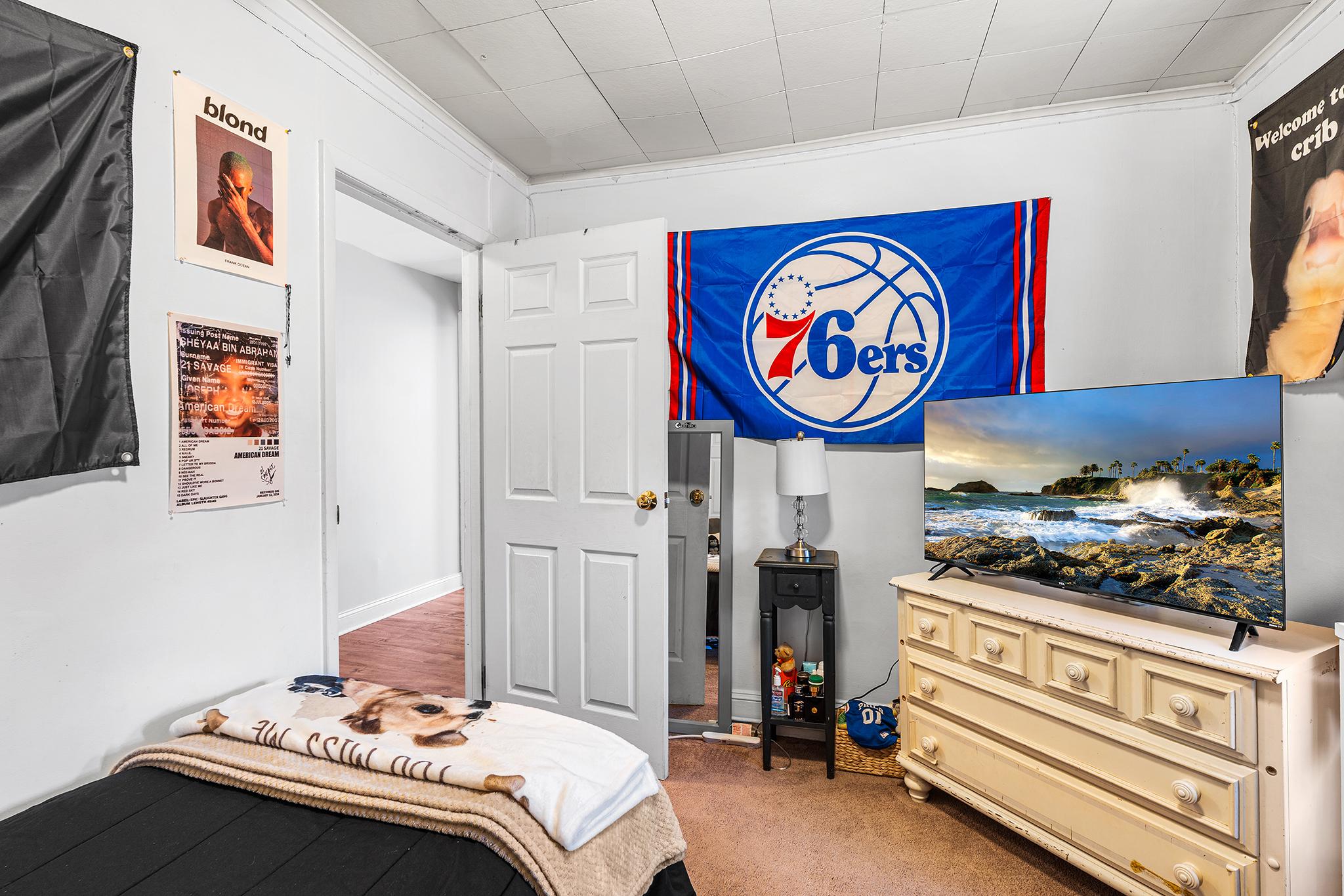 16 Volusia Avenue Hamilton, NJ 08610 - Photo 17 of 50 a bathroom with a sink and a mirror