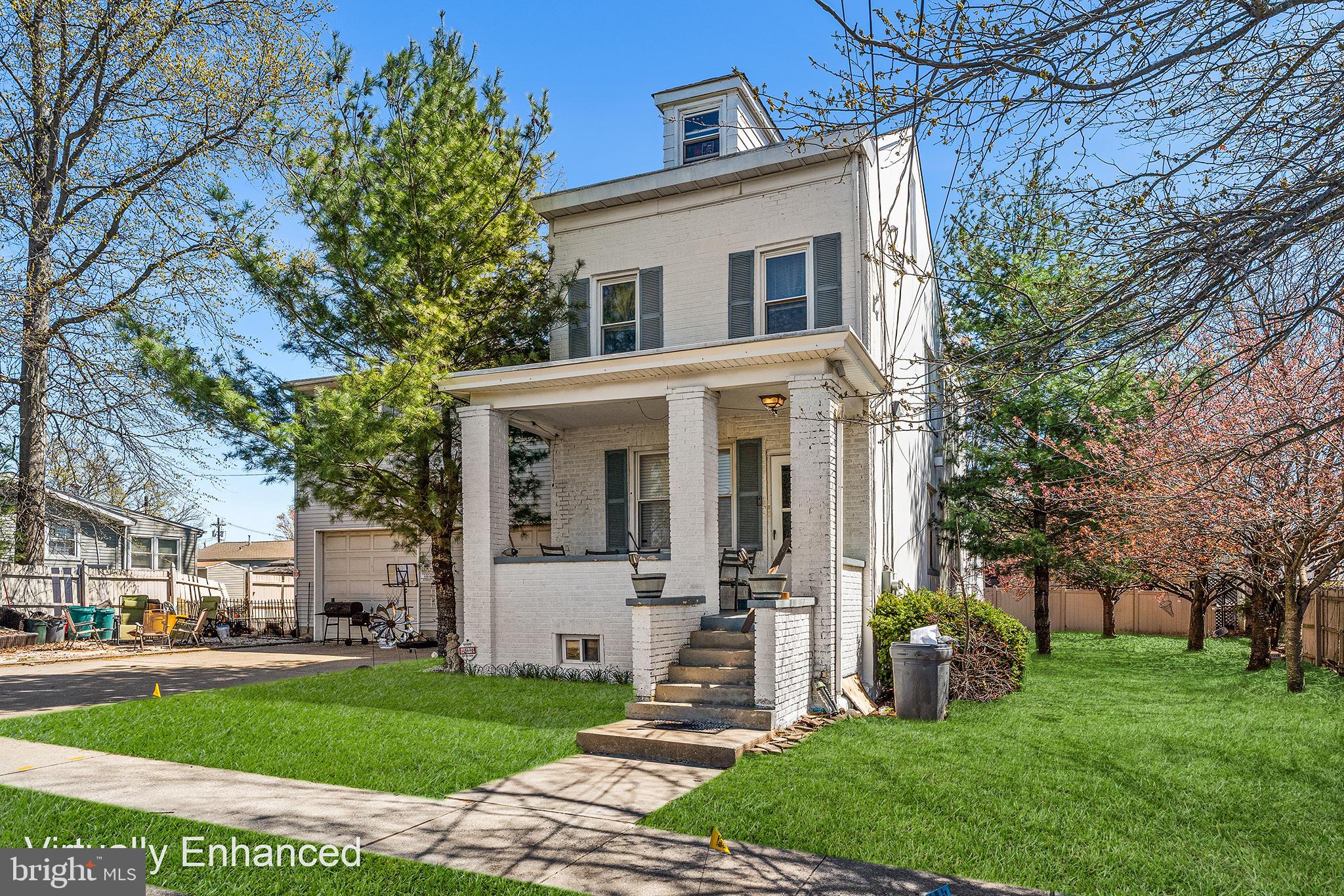 16 Volusia Avenue Hamilton, NJ 08610 - Photo 2 of 50 a front view of a house with a yard