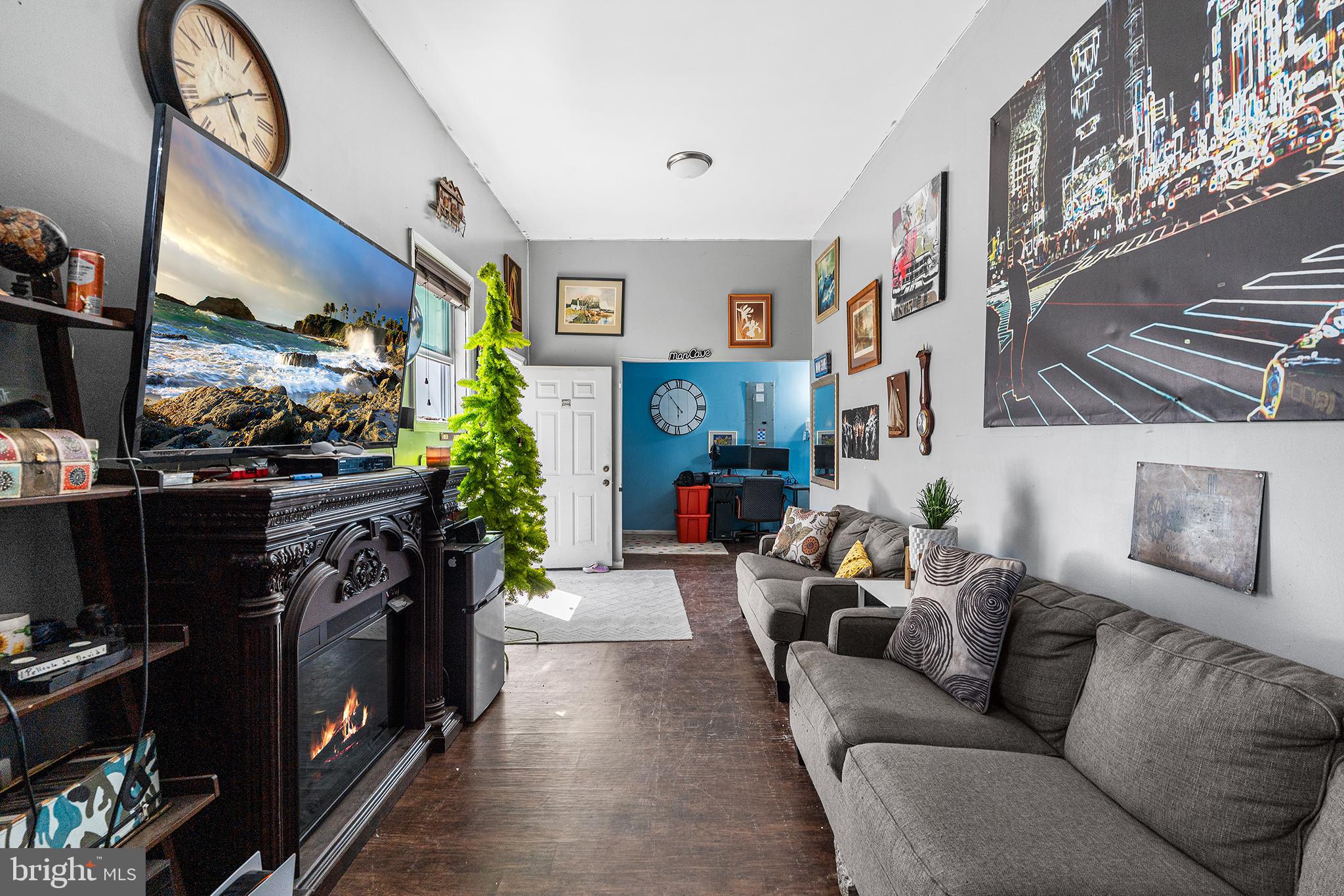 16 Volusia Avenue Hamilton, NJ 08610 - Photo 30 of 50 a living room with furniture and a flat screen tv