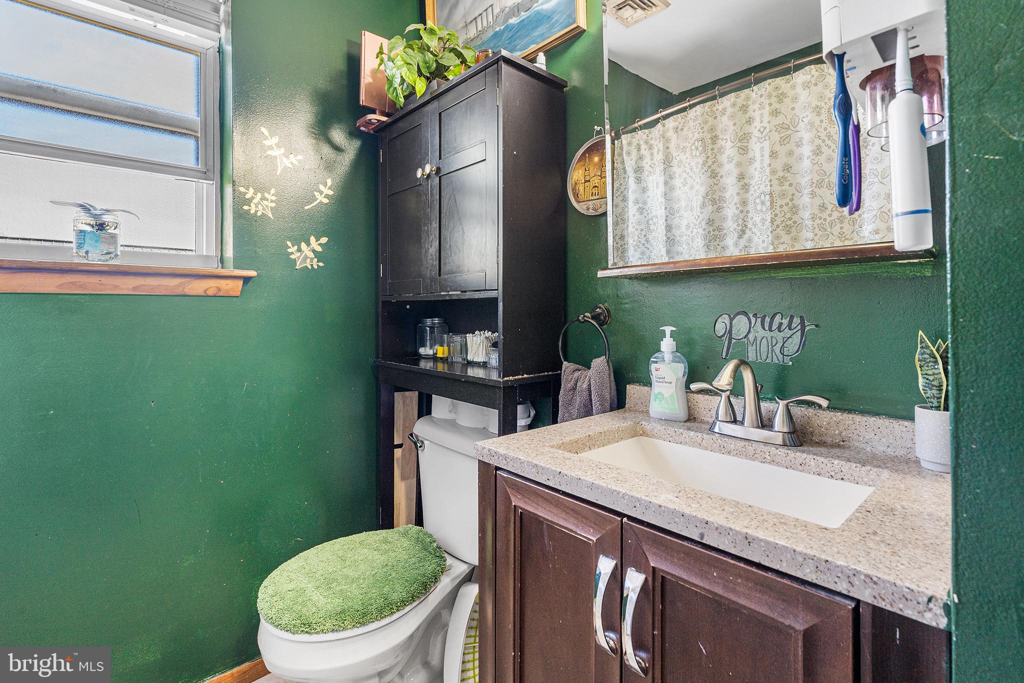16 Volusia Avenue Hamilton, NJ 08610 - Photo 41 of 50 a kitchen with a sink and a toilet