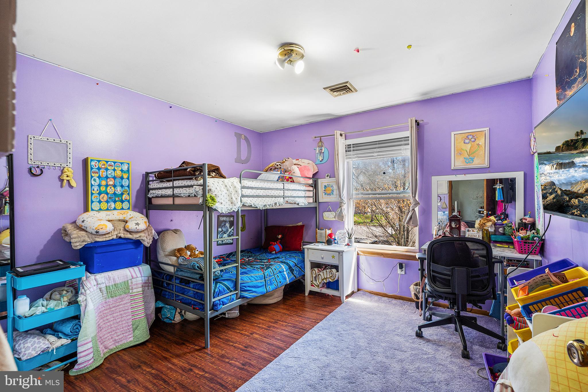 16 Volusia Avenue Hamilton, NJ 08610 - Photo 45 of 50 a living room with lots of furniture and a dining table with bookshelf