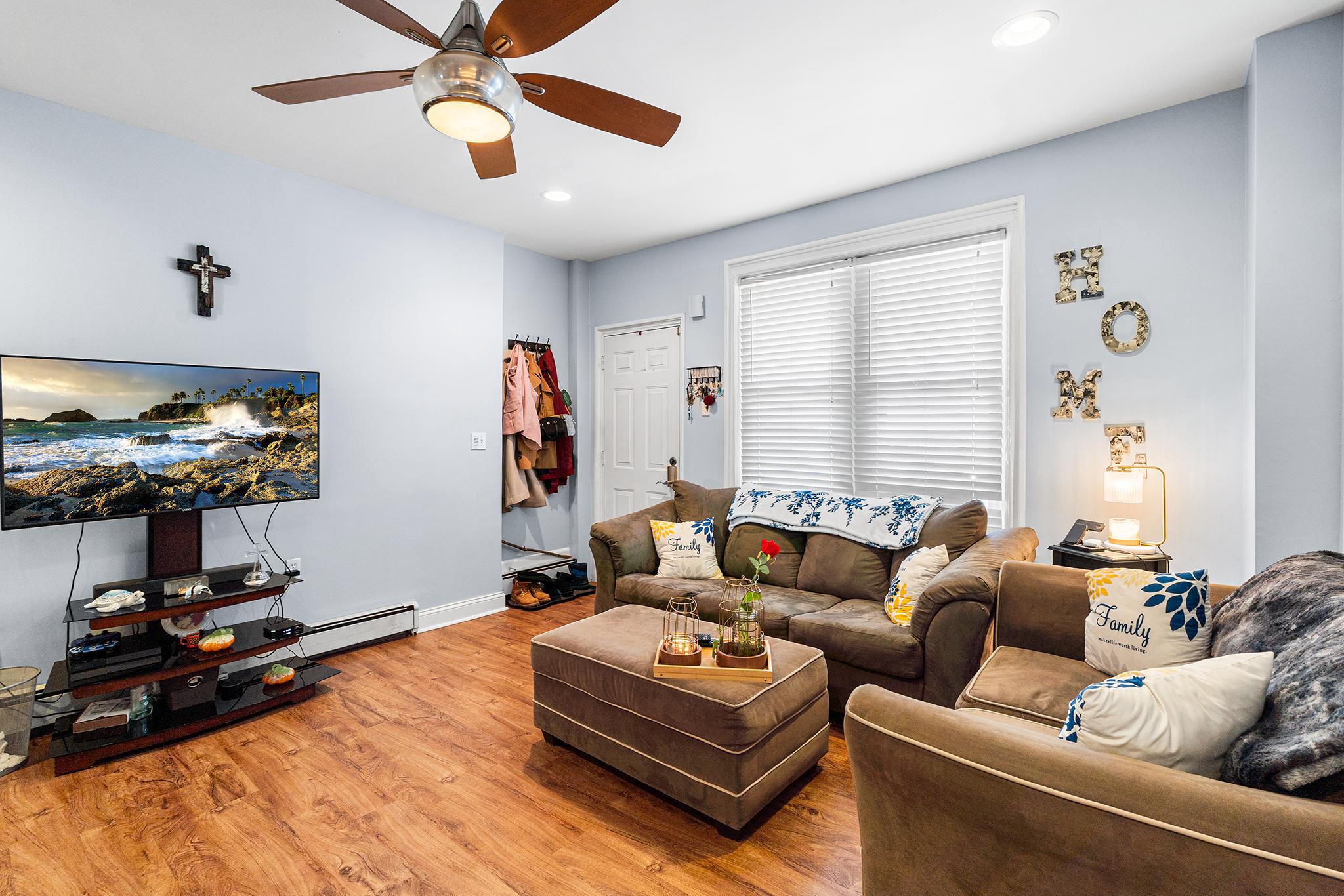 16 Volusia Avenue Hamilton, NJ 08610 - Photo 5 of 50 a living room with furniture and a flat screen tv