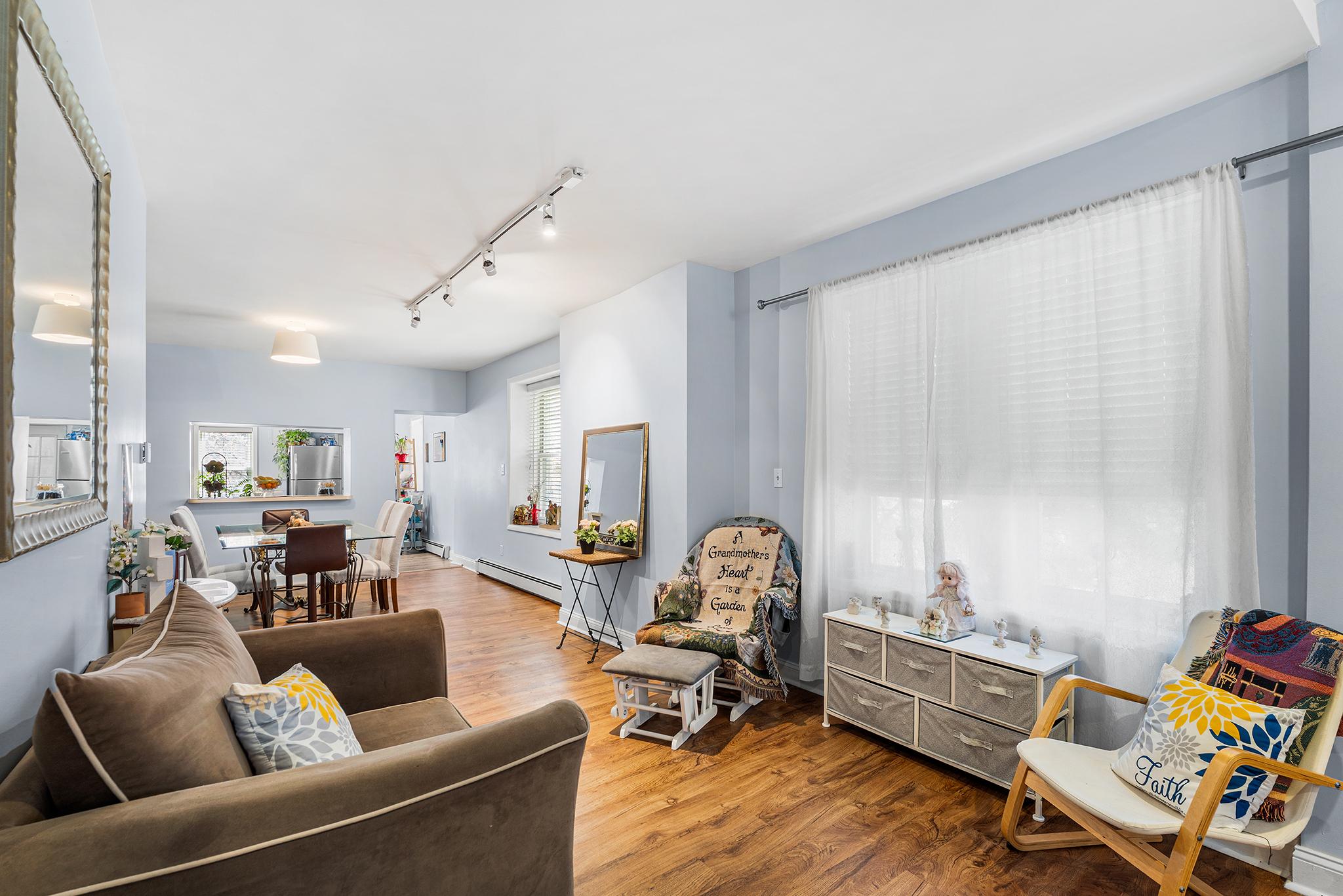 16 Volusia Avenue Hamilton, NJ 08610 - Photo 6 of 50 a living room with furniture and a wooden floor