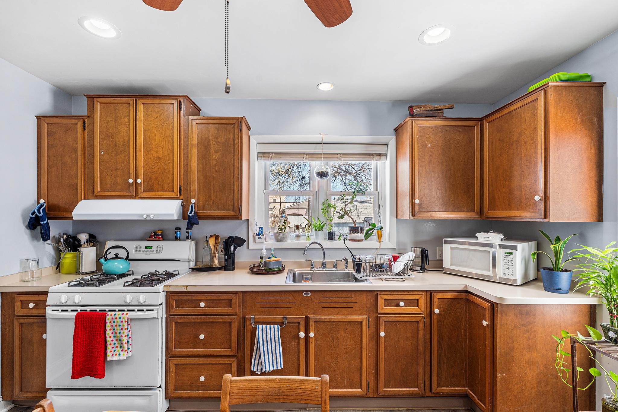 16 Volusia Avenue Hamilton, NJ 08610 - Photo 10 of 50 a kitchen with stainless steel appliances granite countertop a refrigerator and sink