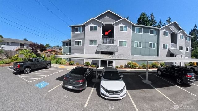 a view of a chairs and table in the patio