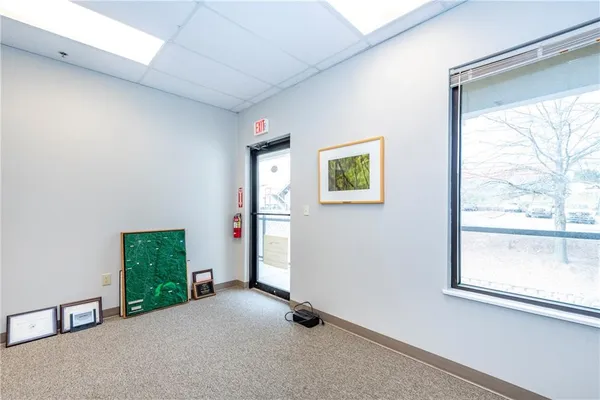 a view of a room that has a window