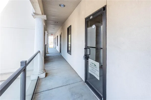 a hallway with windows