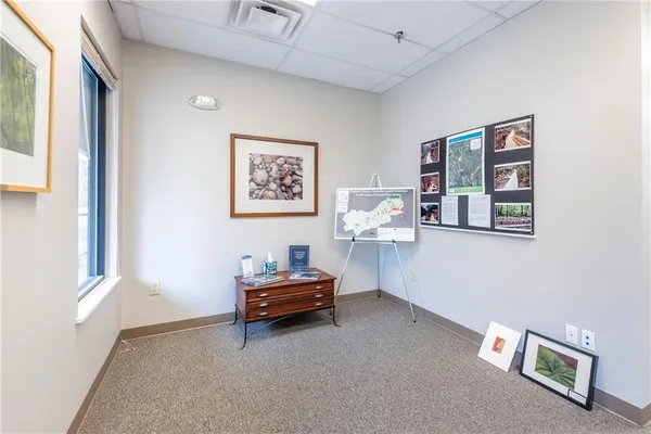 a view of room with window and workspace