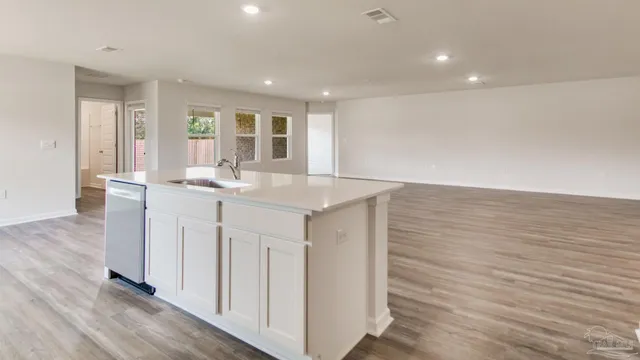 a view of kitchen with wooden floor