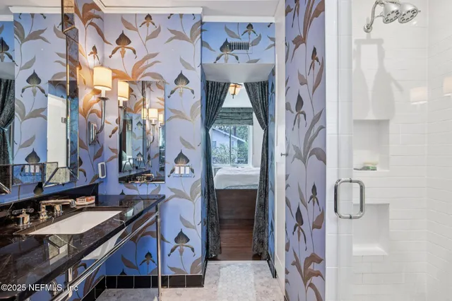 a bathroom with a sink and a mirror