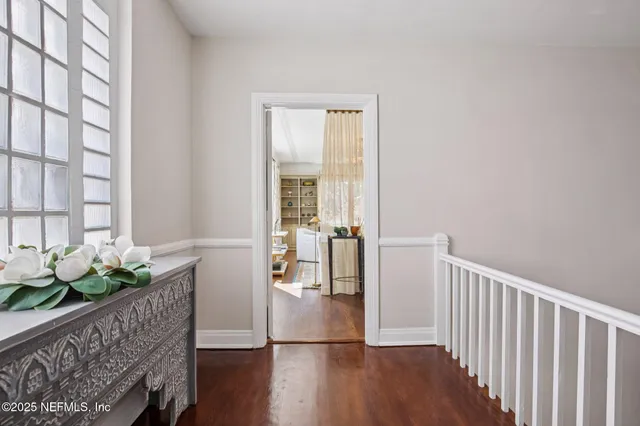 a view of entryway with wooden floor