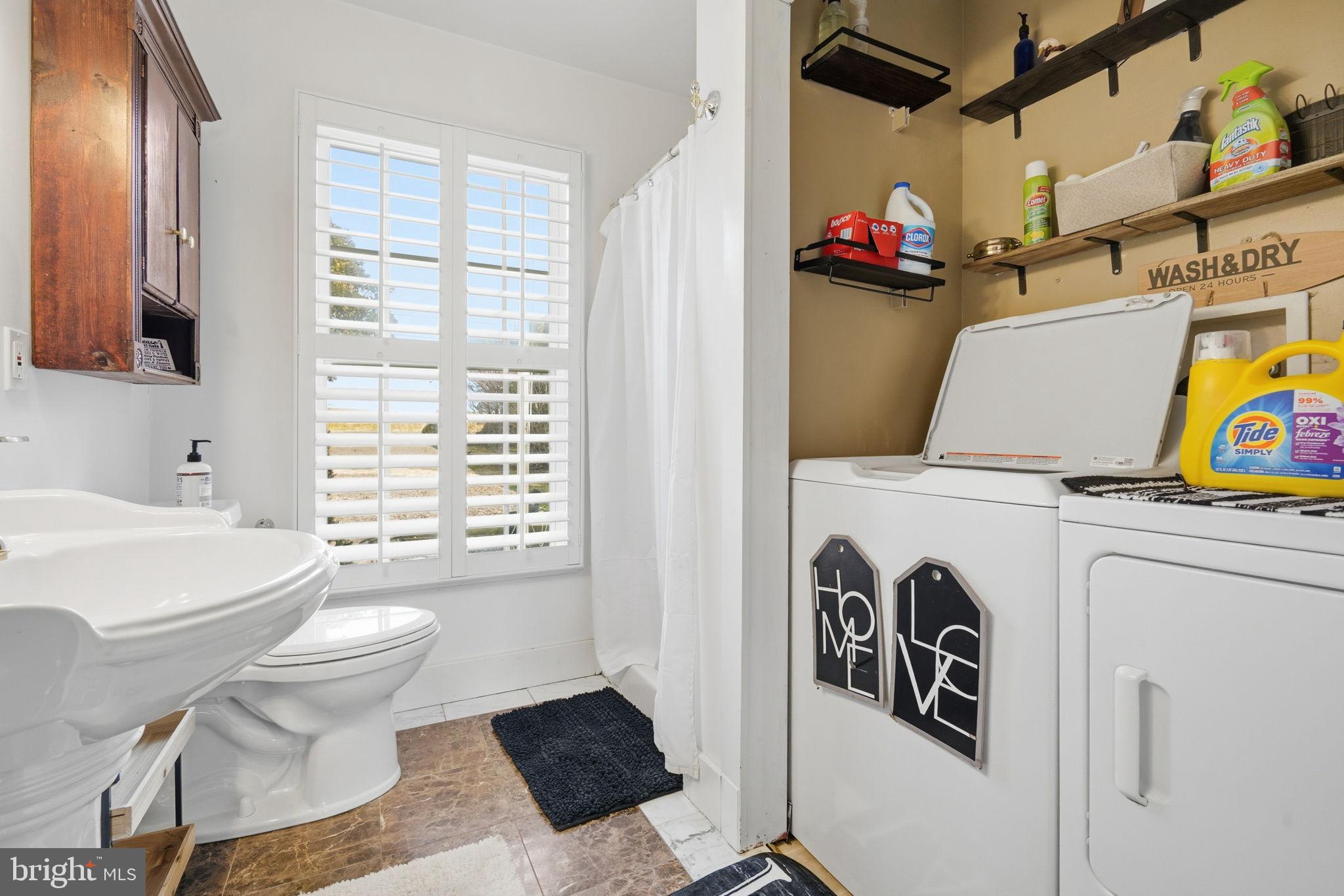 32135 River Road Millington, MD 21651 - Photo 14 of 33 a view of a bathroom with a sink and a toilet
