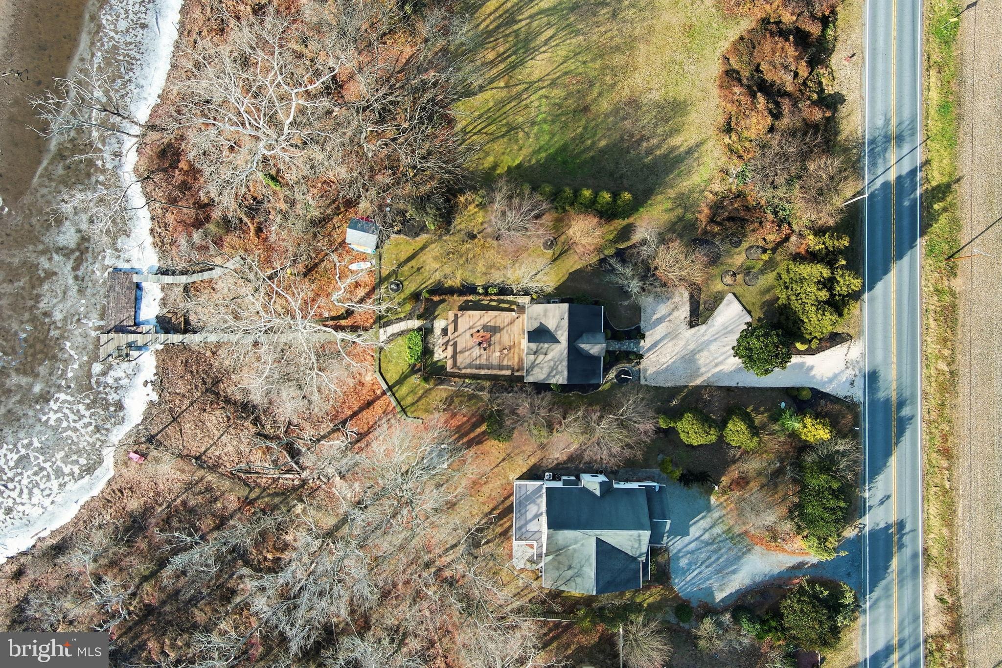 32135 River Road Millington, MD 21651 - Photo 2 of 33 an aerial view of a house with a yard
