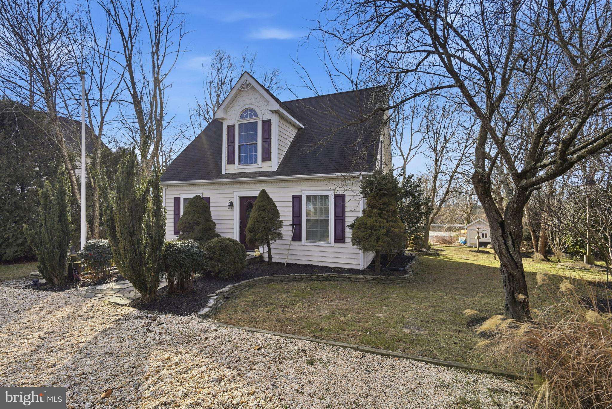 32135 River Road Millington, MD 21651 - Photo 3 of 33 a front view of a house with a yard