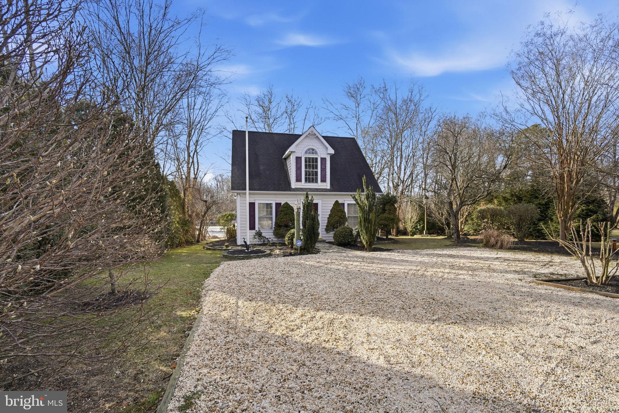 32135 River Road Millington, MD 21651 - Photo 4 of 33 a front view of a house with a yard
