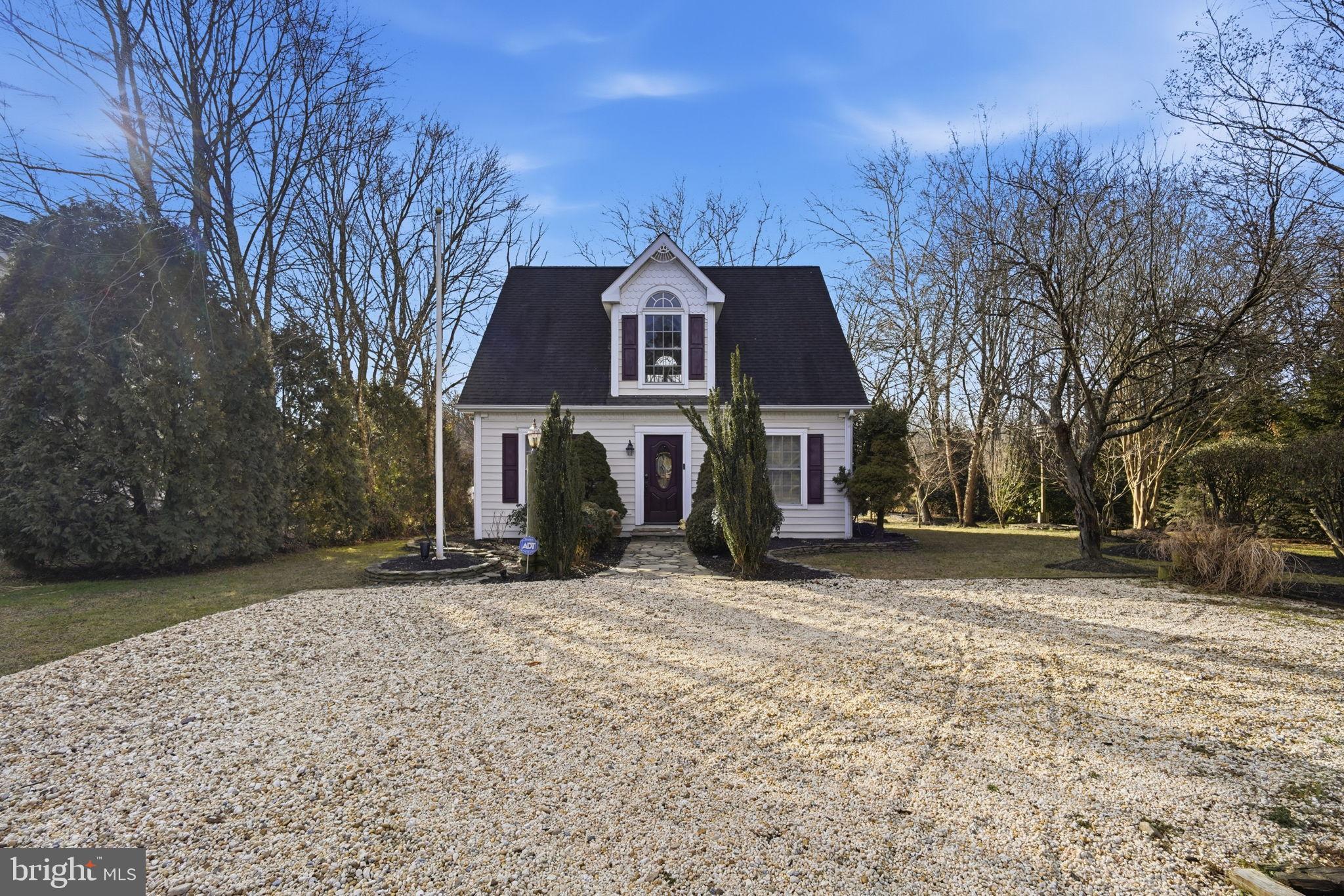 32135 River Road Millington, MD 21651 - Photo 5 of 33 a front view of a house with a yard