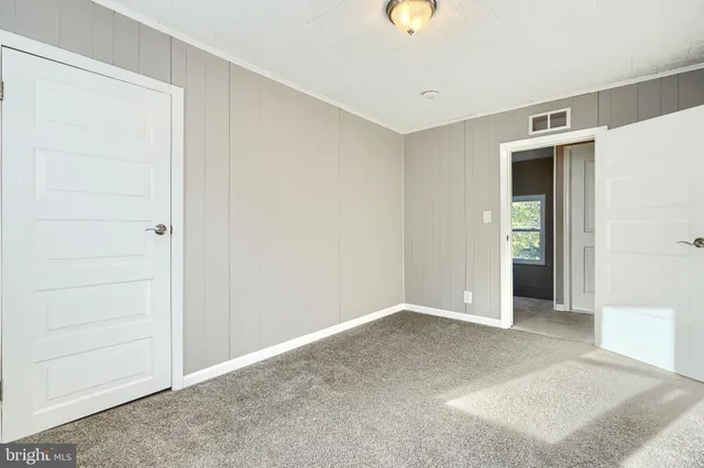 an empty room with closet