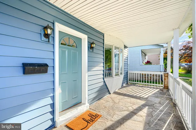 a view of a balcony with wooden floor