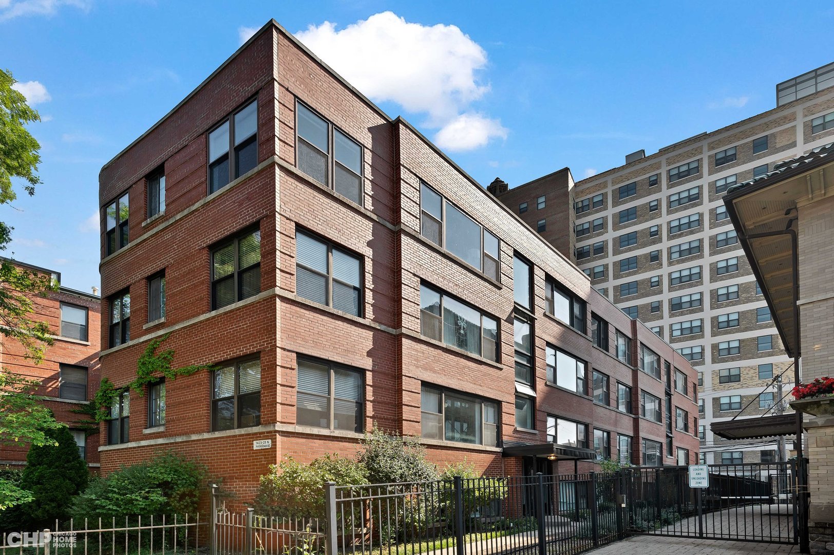 7425 North Sheridan Road, Unit 1E Chicago, IL 60626 - Photo 1 of 31 a front view of a building