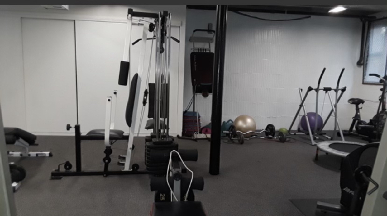 7425 North Sheridan Road, Unit 1E Chicago, IL 60626 - Photo 29 of 31 a view of a room with gym equipment