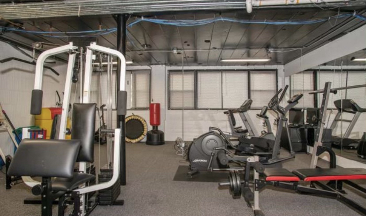 7425 North Sheridan Road, Unit 1E Chicago, IL 60626 - Photo 30 of 31 a view of a room with gym equipment