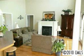 3886 State Rd S-29-304 Lancaster, SC 29720 - Photo 3 of 8 a living room with furniture and a fireplace