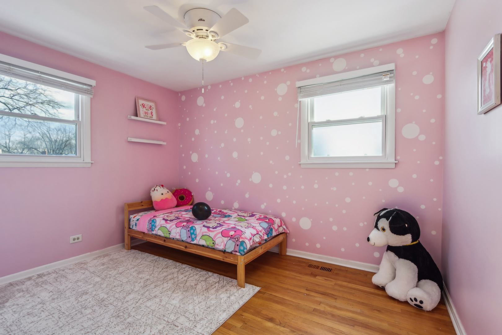 1925 Briarcliffe Boulevard Wheaton, IL 60189 - Photo 15 of 46 a bedroom with furniture and a window
