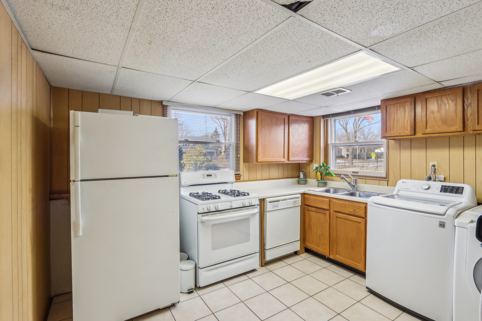1925 Briarcliffe Boulevard Wheaton, IL 60189 - Photo 36 of 46 a kitchen with cabinets stainless steel appliances and sink