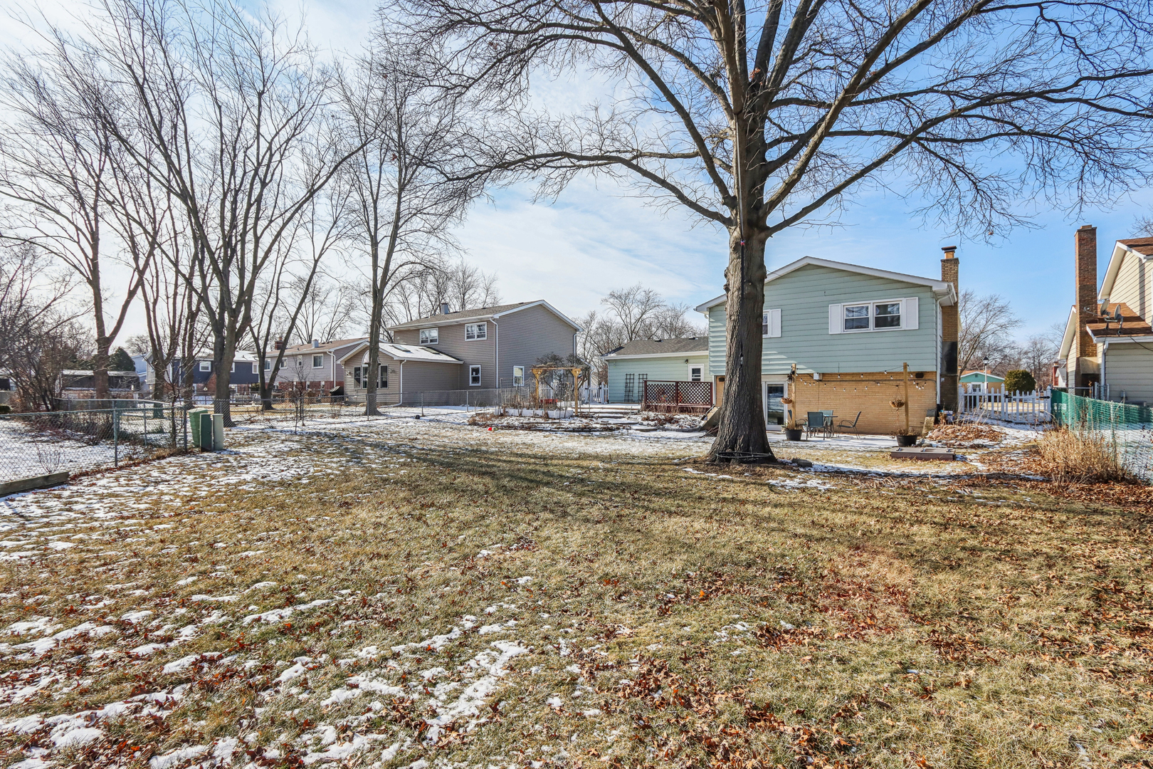 1925 Briarcliffe Boulevard Wheaton, IL 60189 - Photo 42 of 46 a view of road with large trees