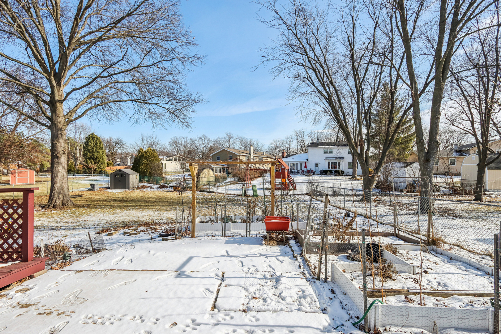 1925 Briarcliffe Boulevard Wheaton, IL 60189 - Photo 43 of 46 a view of a city with houses
