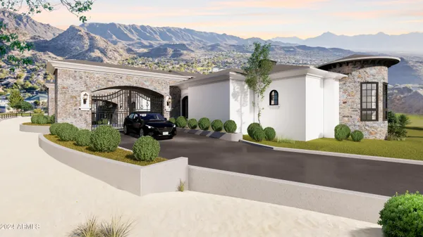 a front view of a house with a garden