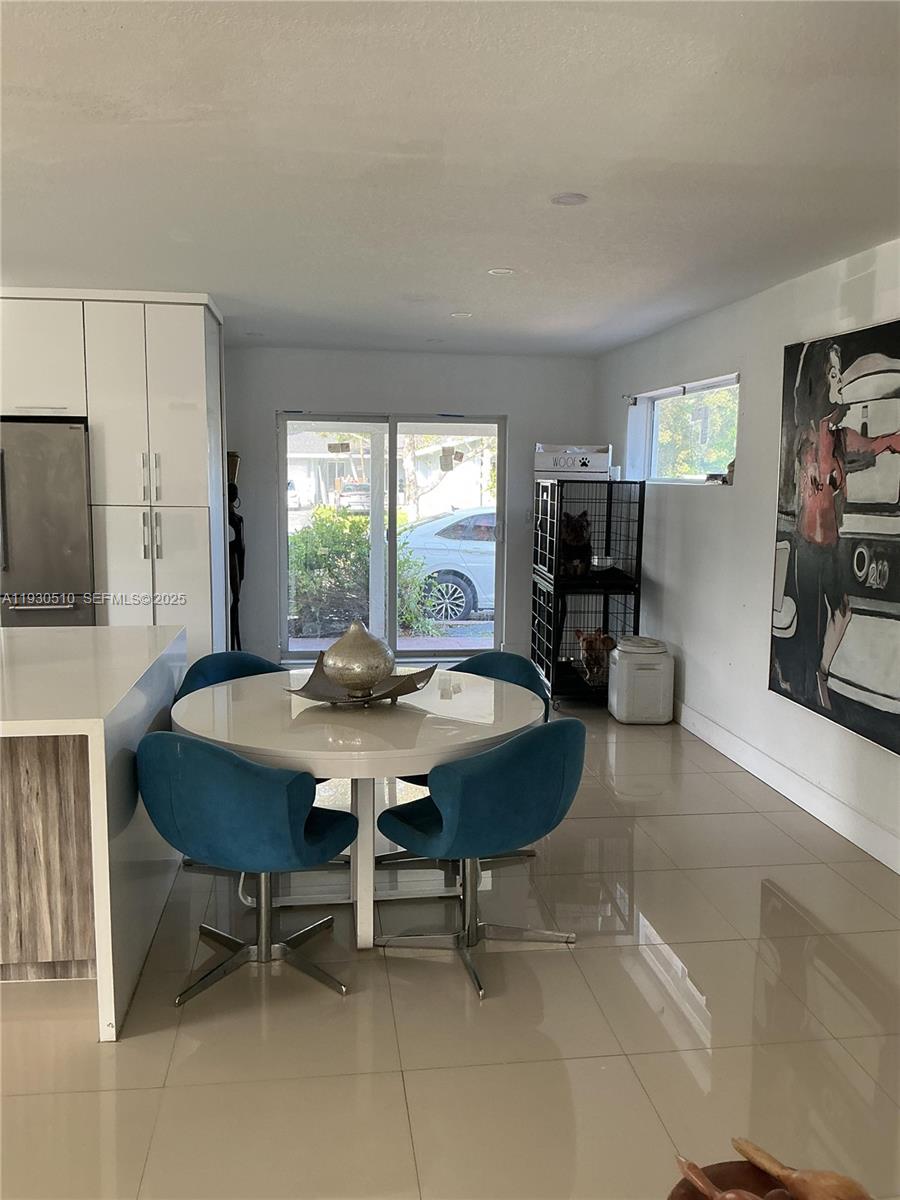 9700 Southwest 189th Street Cutler Bay, FL 33157 - Photo 6 of 21 a view of a dining room with furniture