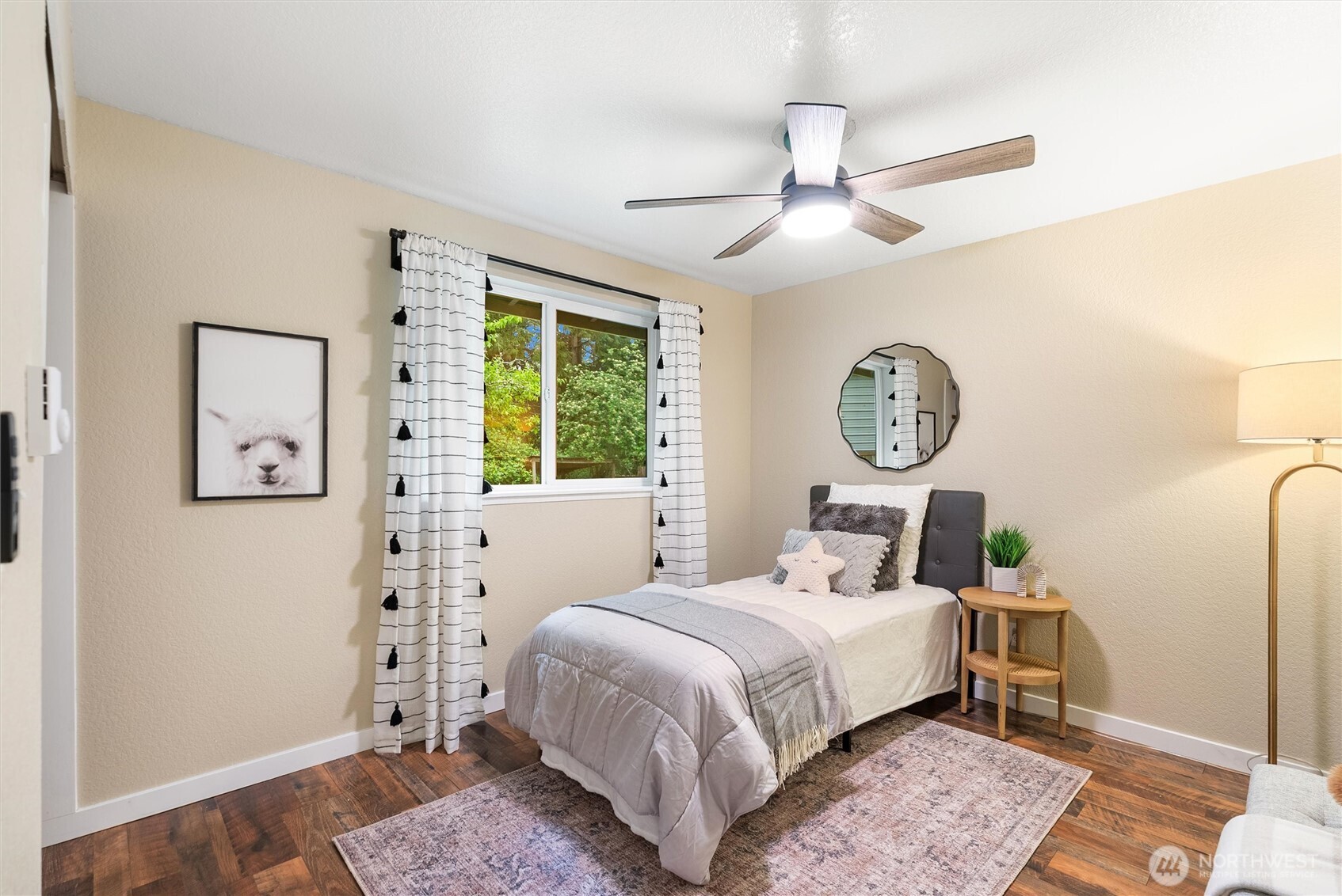 24711 Florence Acres Road Monroe, WA 98272 - Photo 21 of 33 a bedroom with a bed a window and a chandelier
